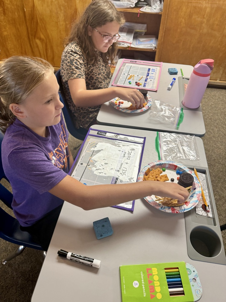 5th graders cooked up some math skills today by using various snacks as manipulatives to model adding decimals. 🥨Ⓜ️🍪