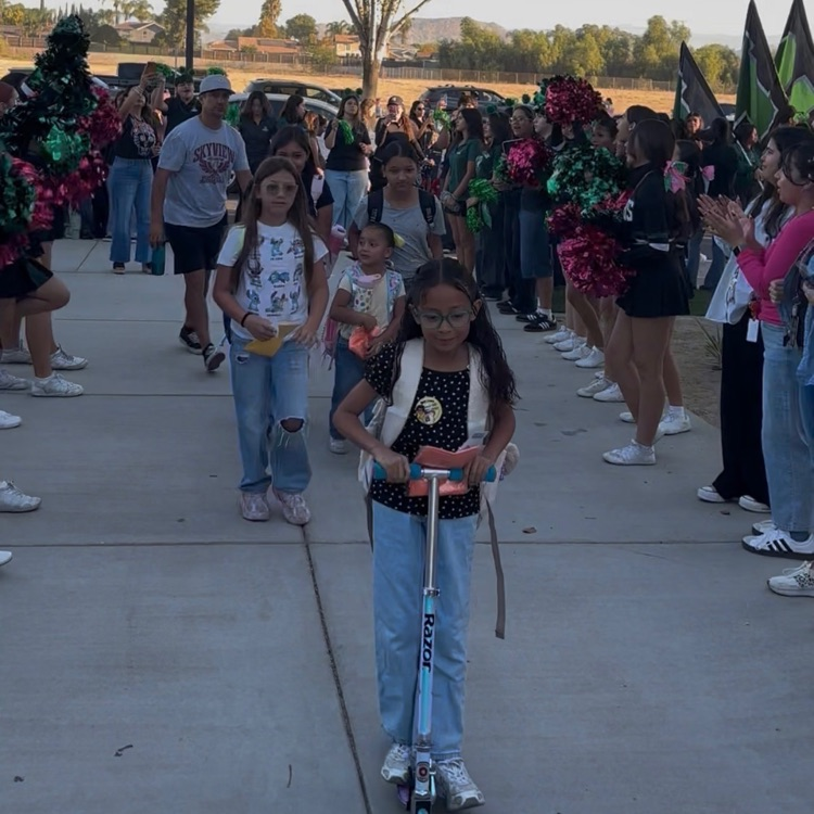 kids riding scooters to school