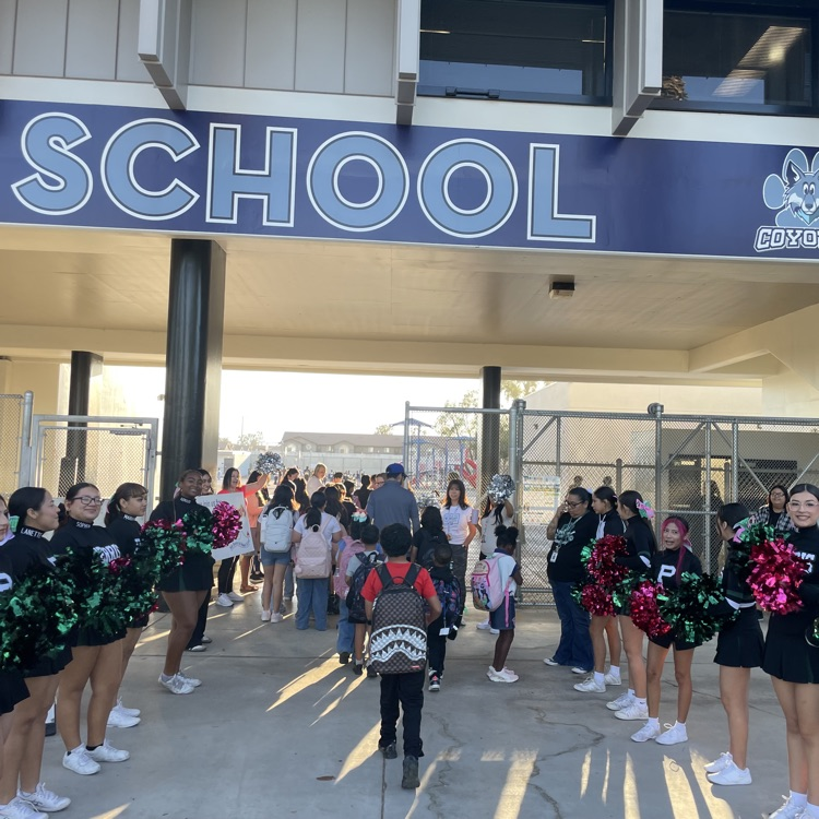 students walking into school