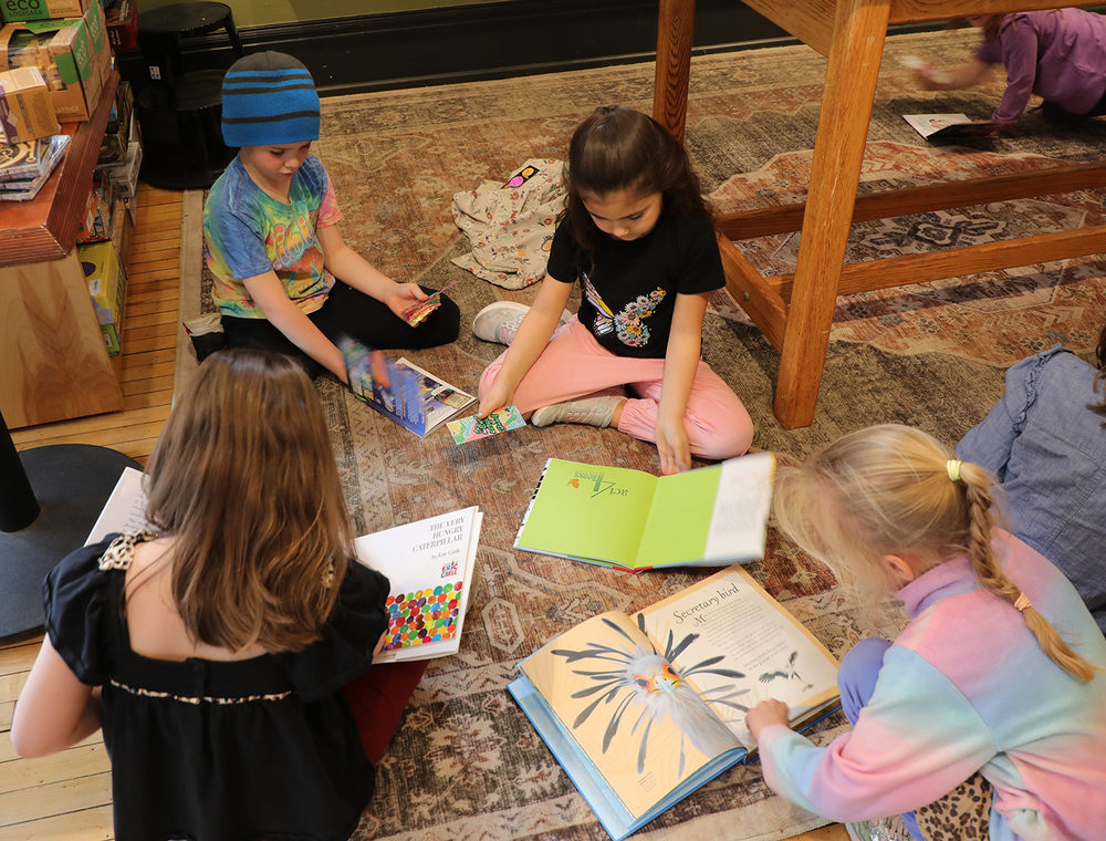 A group of students reading.