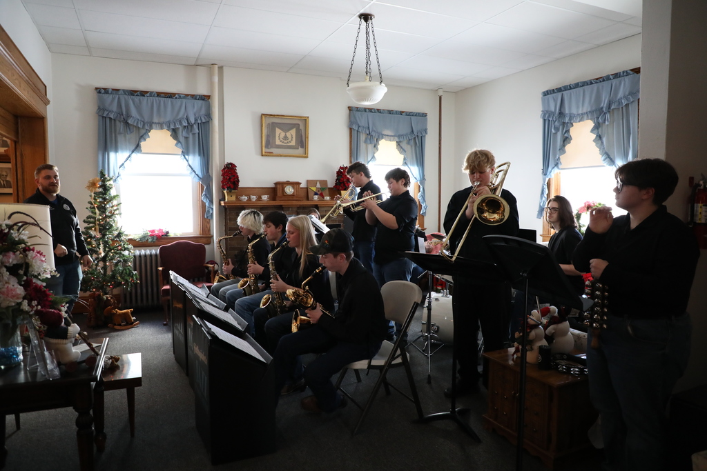 A high school jazz band performing at a Rotary meeting. 