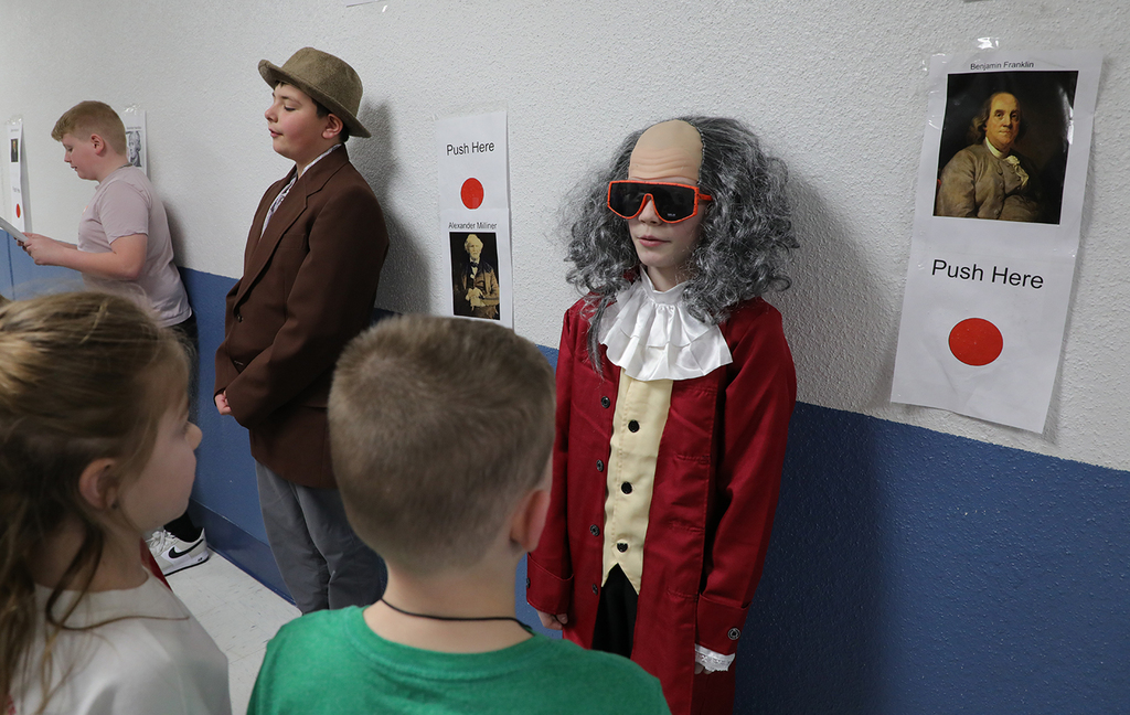 Students dressed as key figures in the Revolutionary War.