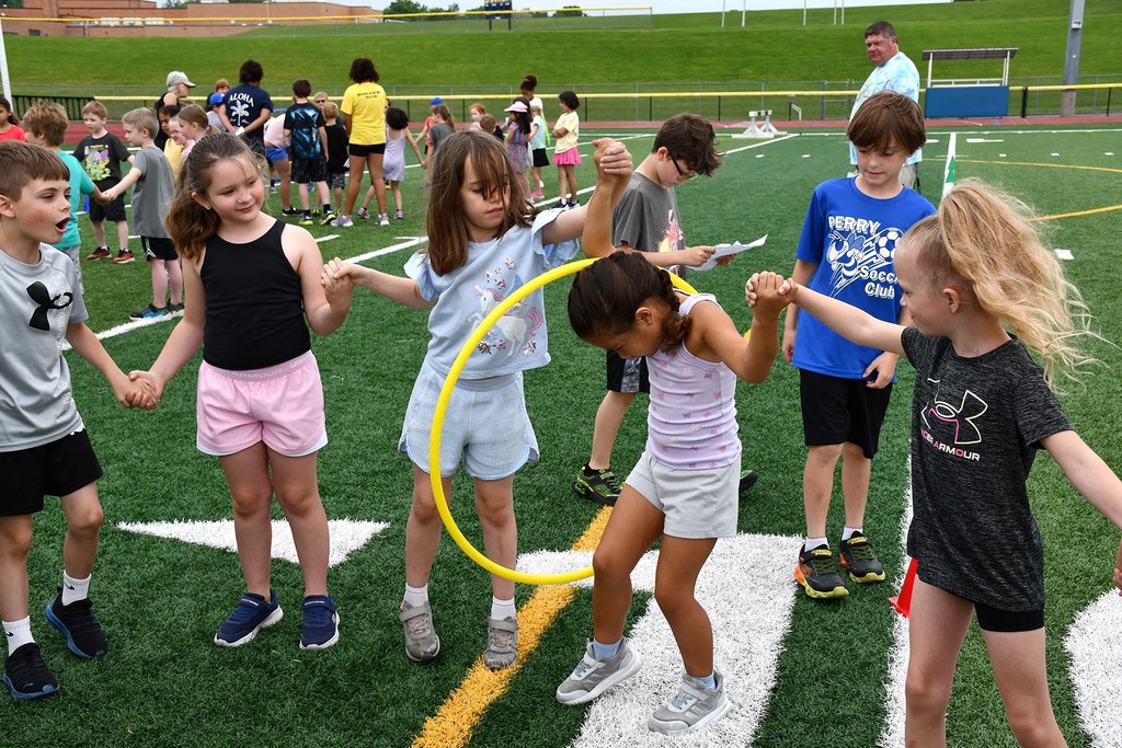 Elementary students competing in field days competitions. 