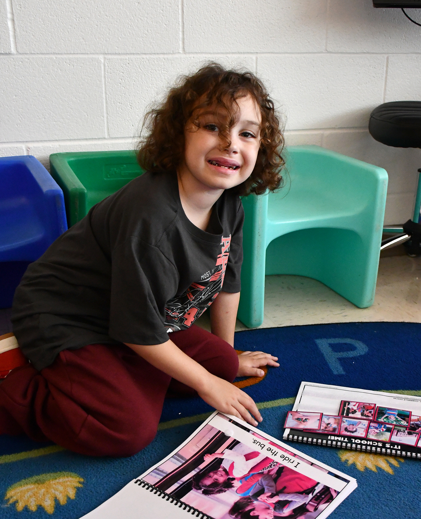 A smiling elementary boy. 