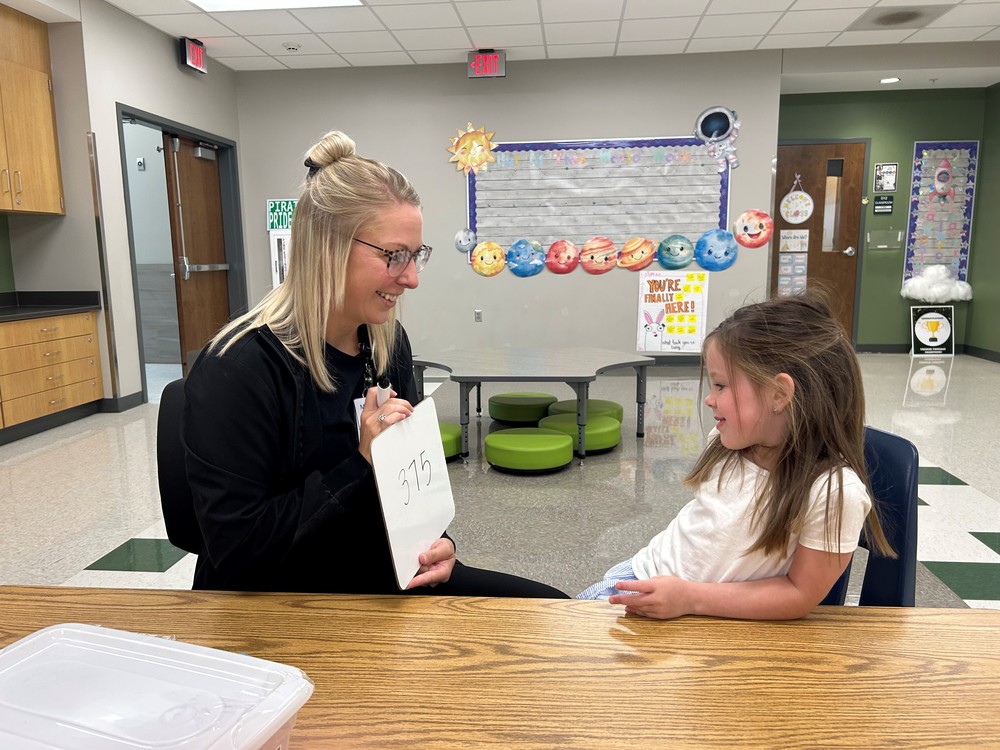 Mercy occupational therapist Megan Vernon works with Perryville Primary Center kindergartener Madeline Kohm.