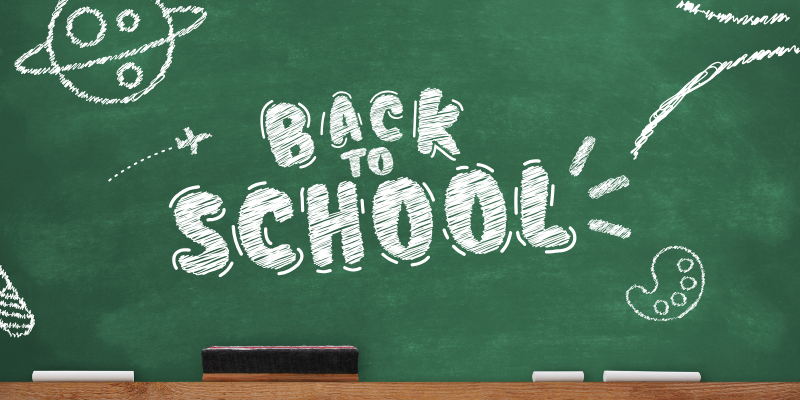 A graphic image of a green chalkboard with "Back To School" written on it. There also chalk drawings of a planet, an airplane, and an artist's palette around the wording.