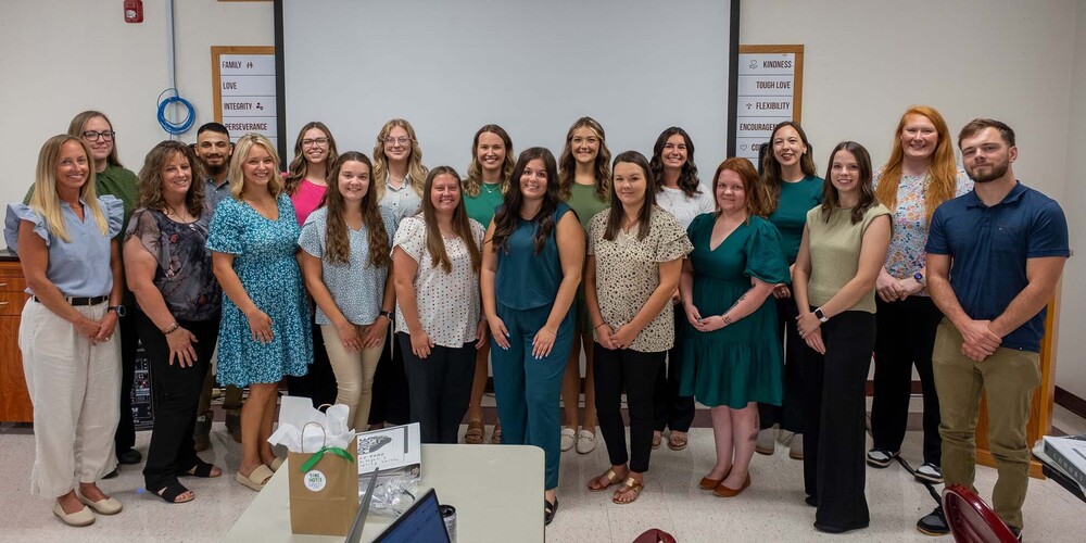 A group photos of the new District 32 teachers standing together.