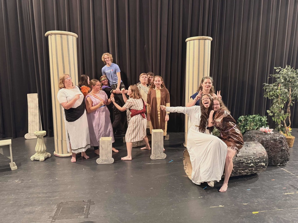 An images of cast members of the Silver Dagger Players in costume preparing to perform "A Midsummer Night's Dream."