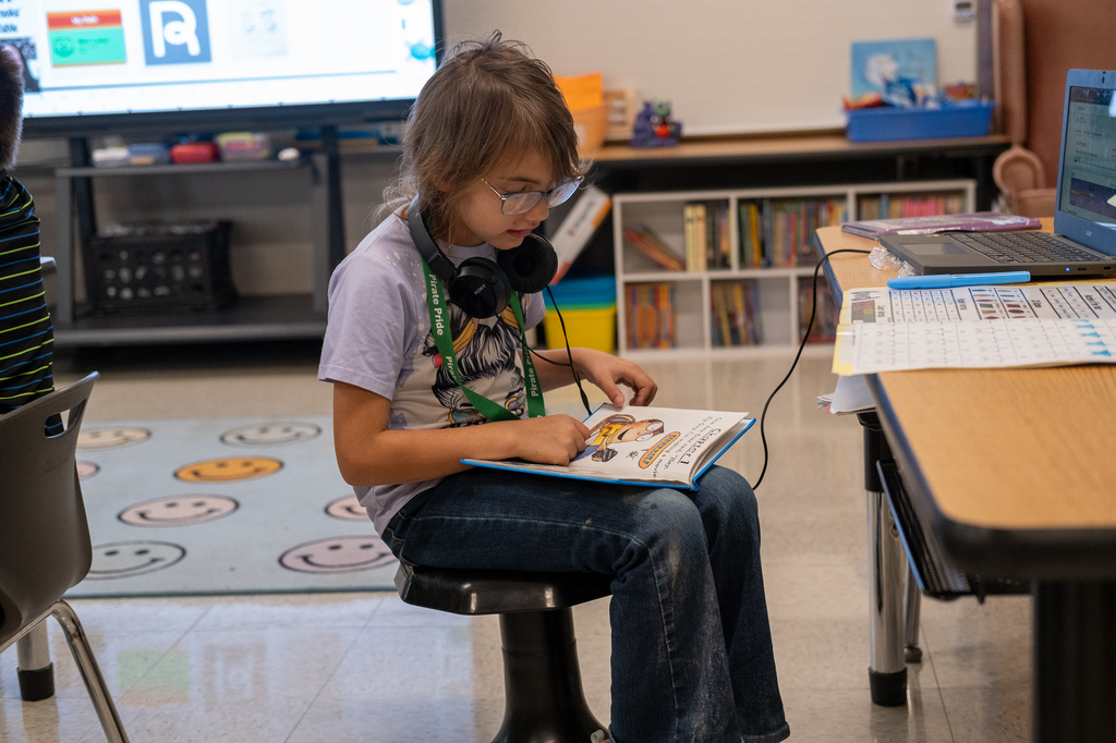 A student reading a book.