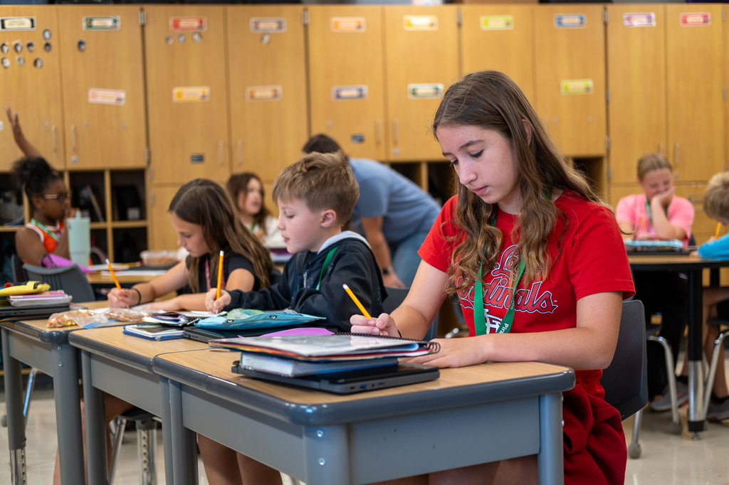 A student works on a worksheet in class.