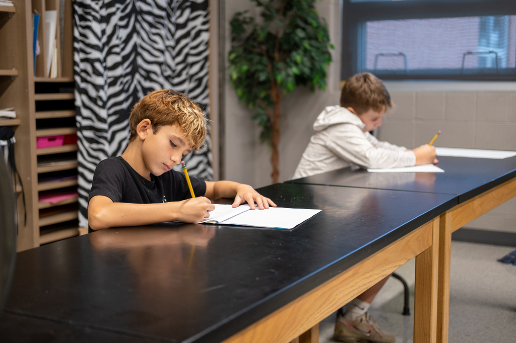 A student works on a drawing