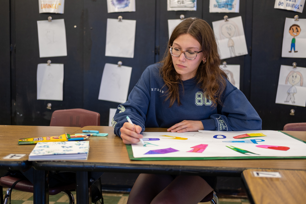 A student works on a drawing project