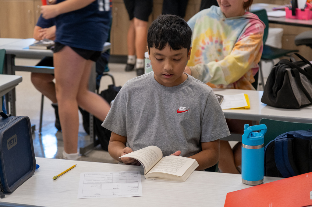 A student reads a book.