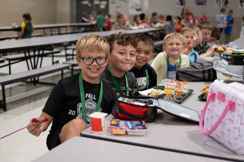 Students eat lunch in a cafeteria