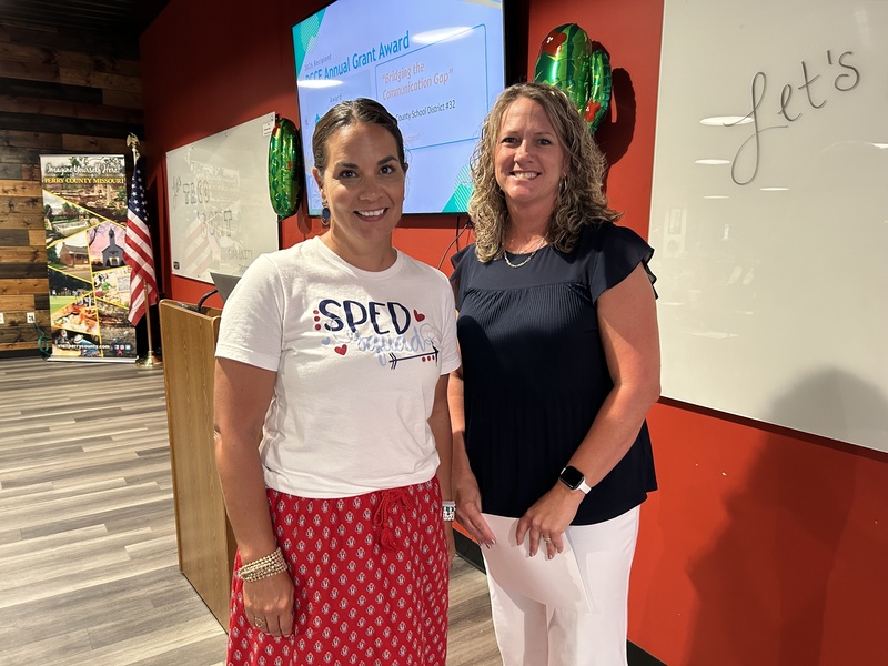 D32 Director of Special Services Stacey Seabaugh stands next to Perry County Community Foundation board member Amy Hager.