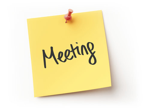Yellow sticky note pinned with a red thumbtack, with the word “Meeting” written on it in black script.