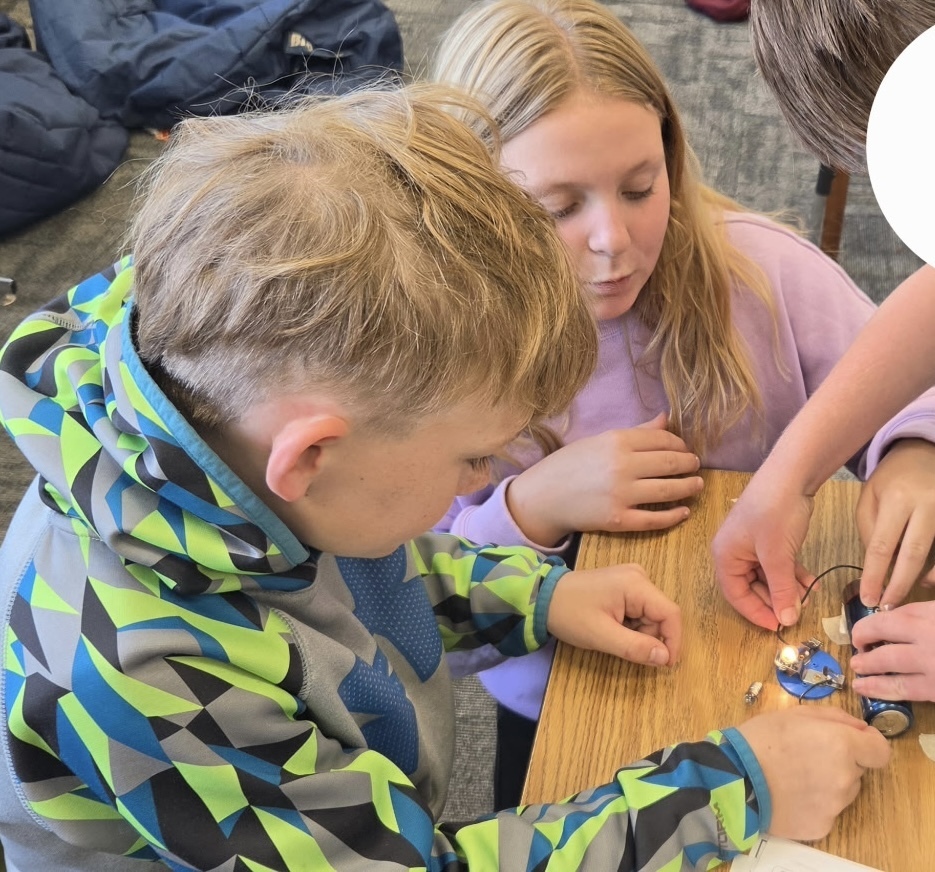 Working on their lightbulbs for Granny's flashlight and adding a switch.l