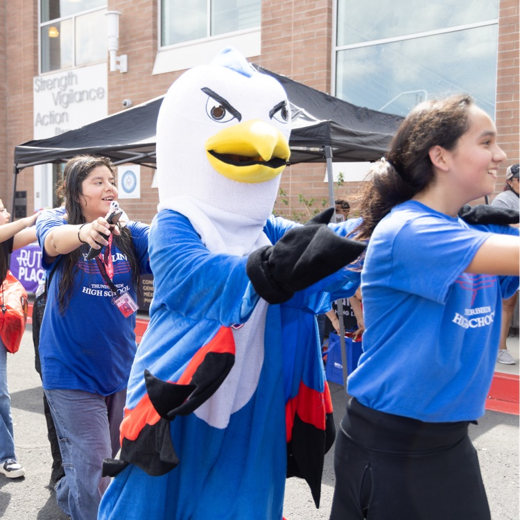 students in conga line