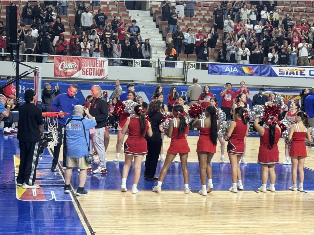 Central's basketball coach and the cheer team