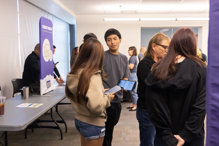 students collaborate on ipads