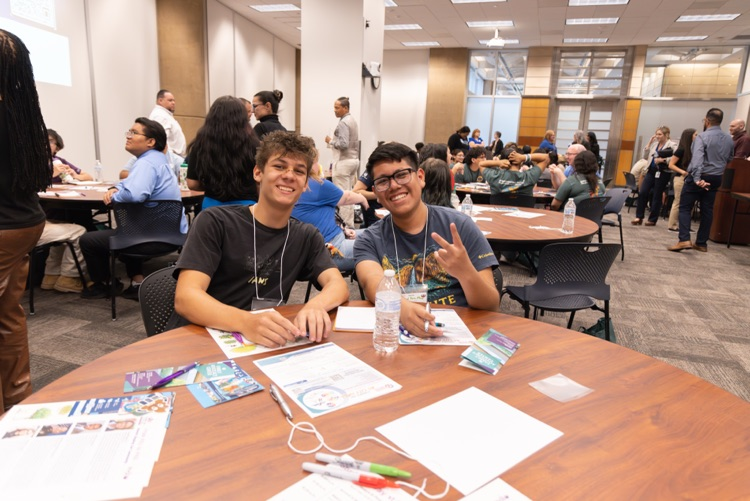 students learning from community partners