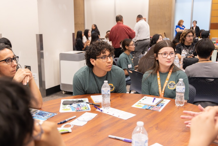 students learning from community partners