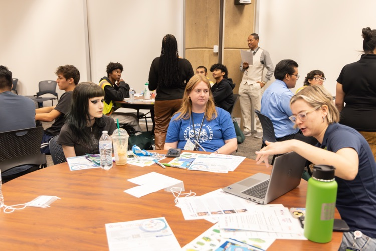 students learning from community partners