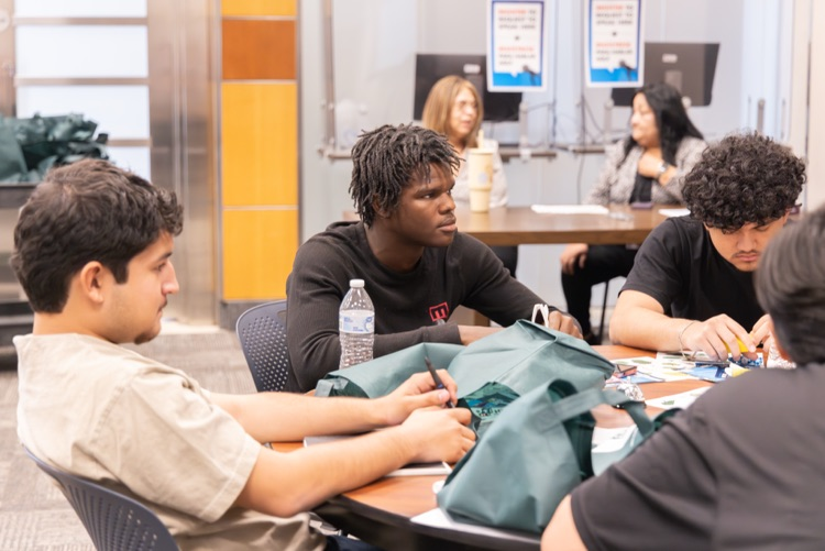 students learning from community partners