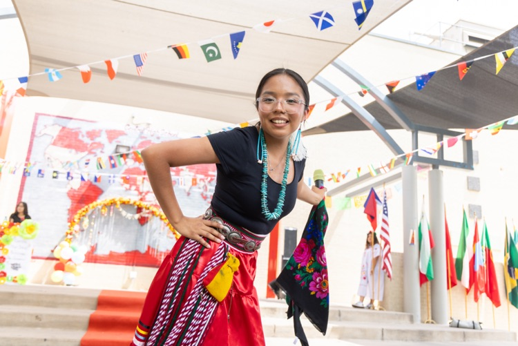 students posing for multicultural fashion show