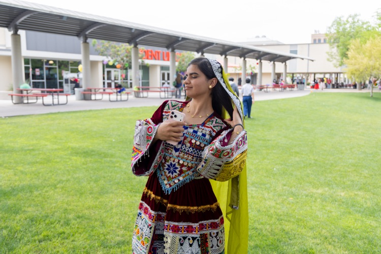 students posing for multicultural fashion show