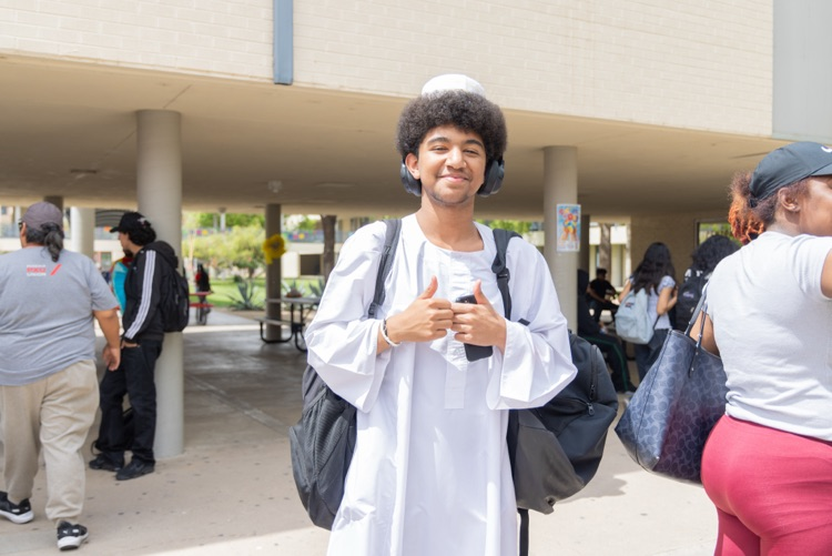 students posing for multicultural fashion show