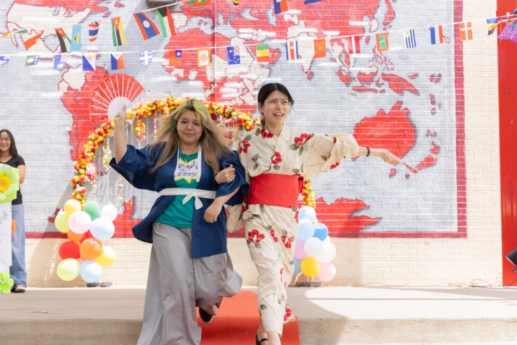 students posing for multicultural fashion show