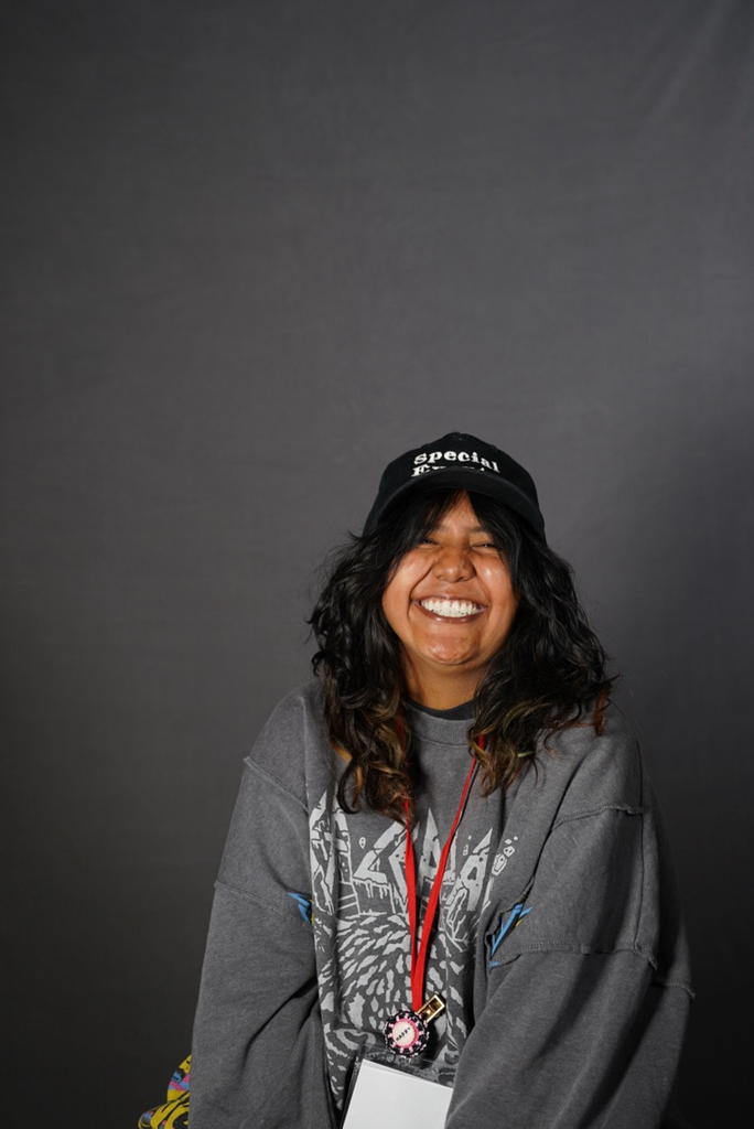portrait of student in grey sweater 