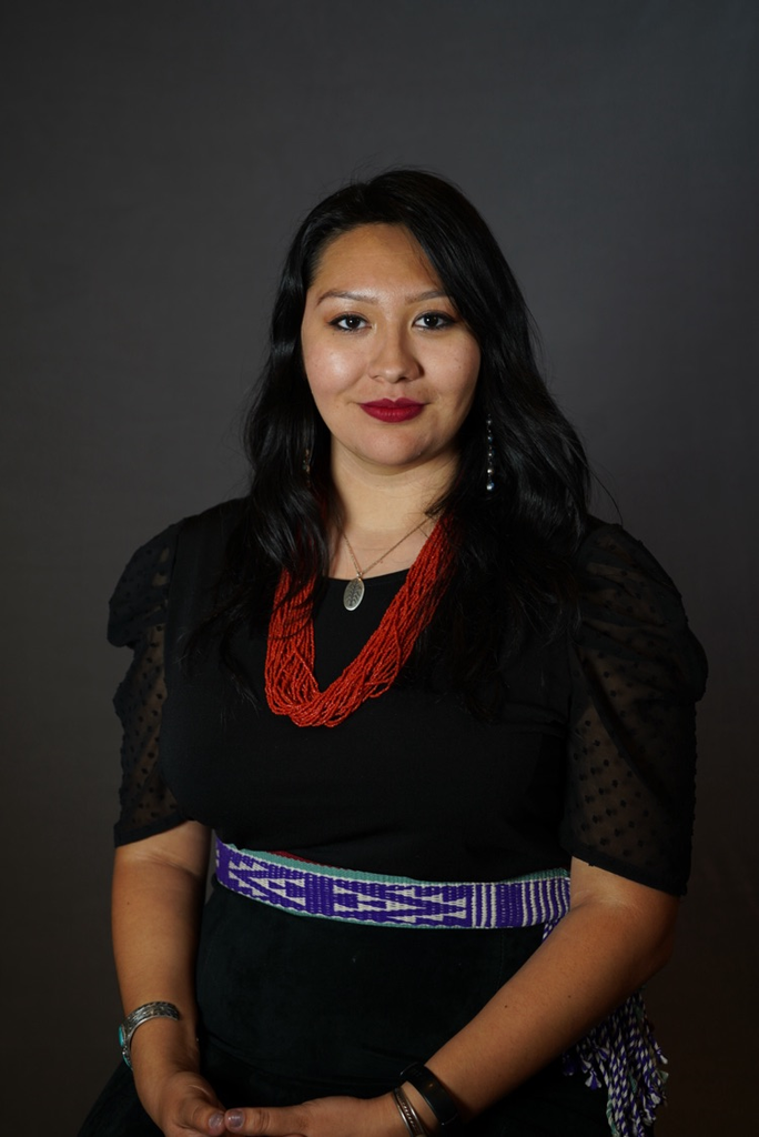 portrait of student with Native American garments