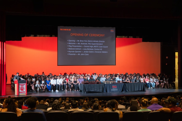students and coaches on stage at the All PXU sports awards