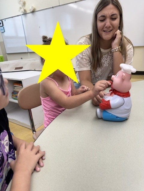 student playing pop the pig