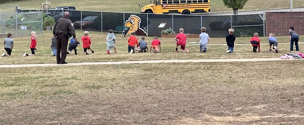 Playground fun with Deputy Roach.