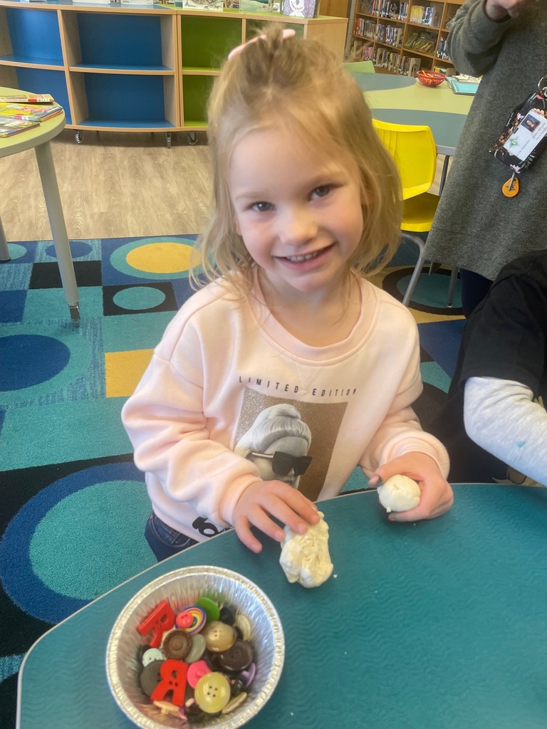 PreK students building snowmen!
