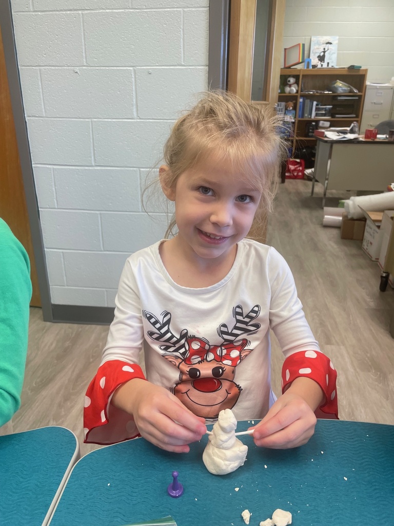 PreK students building snowmen!