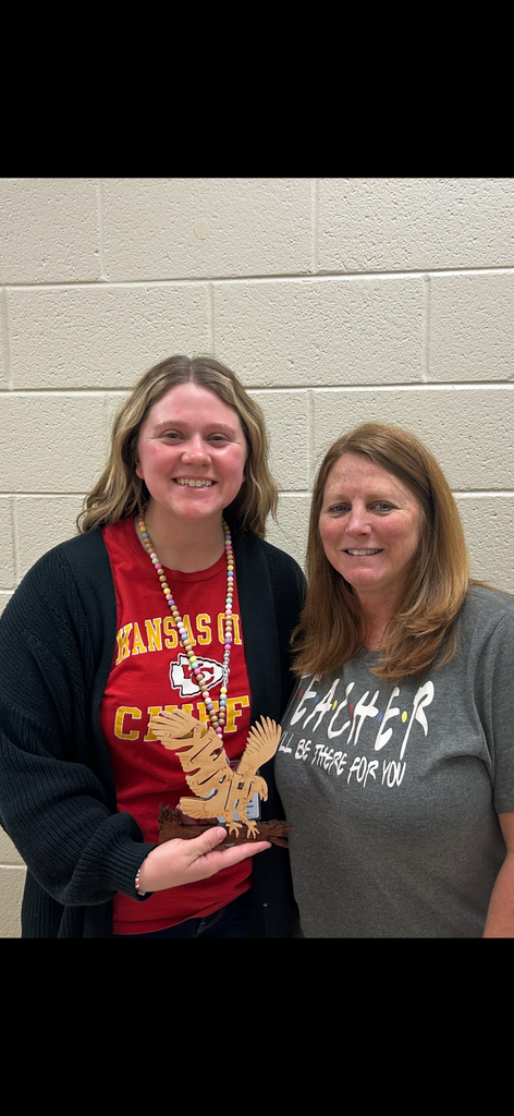 Samantha Roper receives the Hawk.
