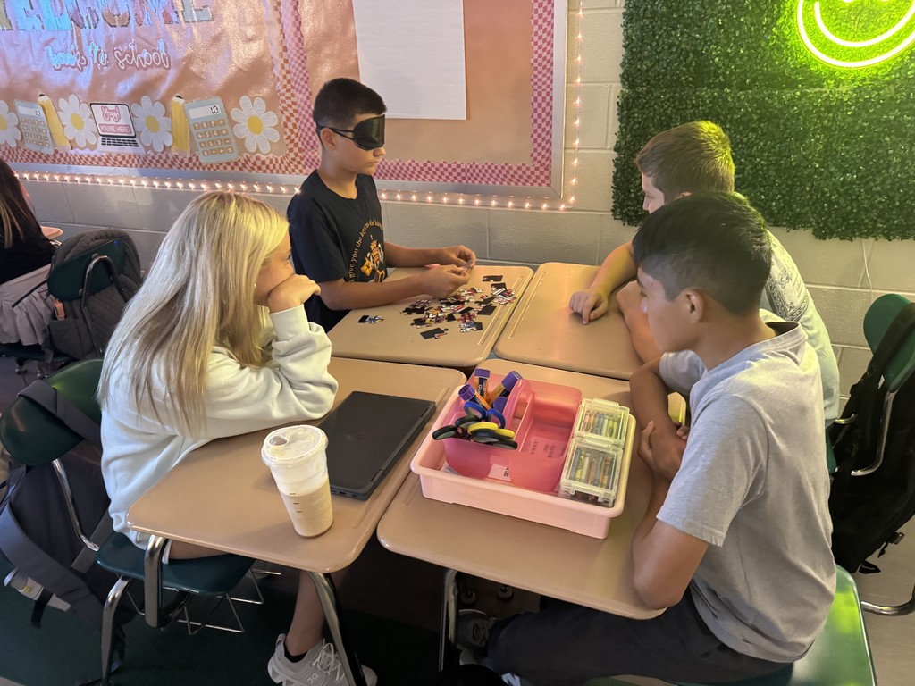 Students working on the puzzle challenge