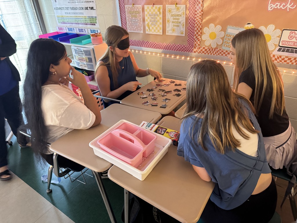 Students working  on the puzzle challenge.
