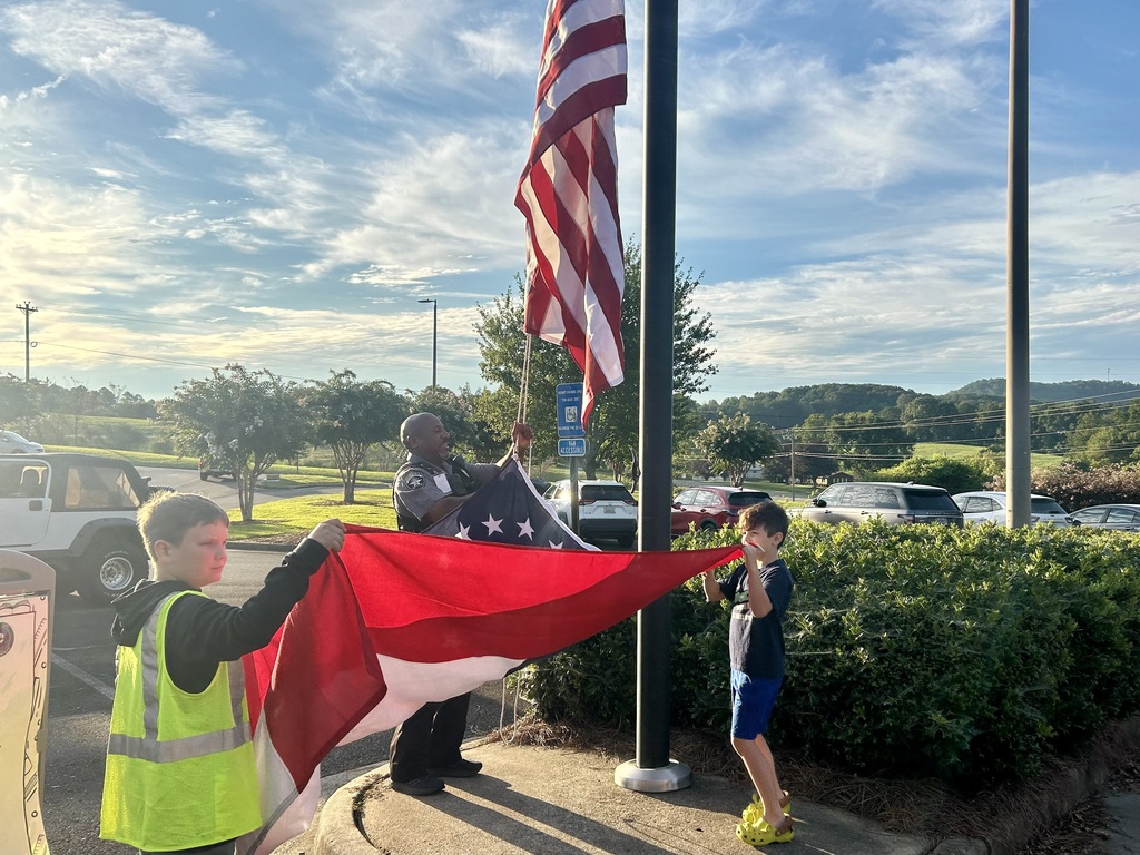 Raising the flags at HCES.