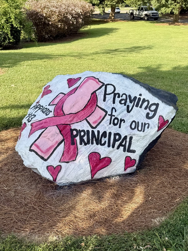 Prayers for Principal on Hawks Rock