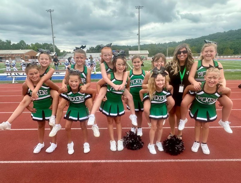 3rd-grade girls Cheerleading Team with Mrs. Shealey.