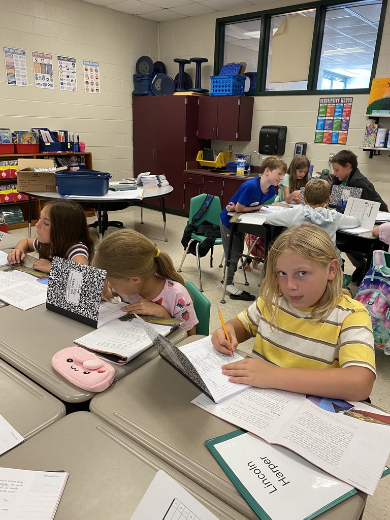 Mrs. Justice's class is working in teams to find relevant details