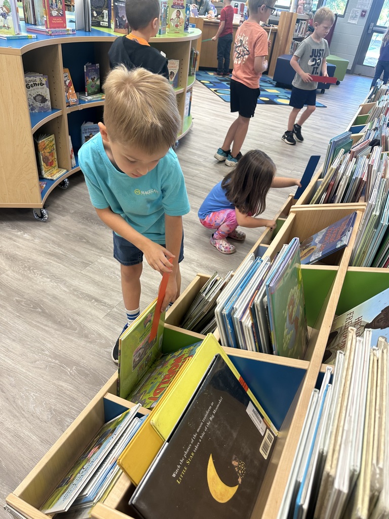 Mrs. Shealey's class visits the media center.
