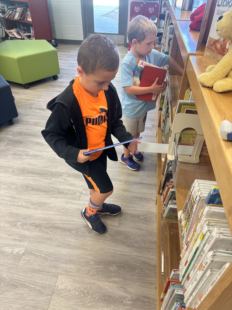 Mrs. Shealey's class visits the media center.