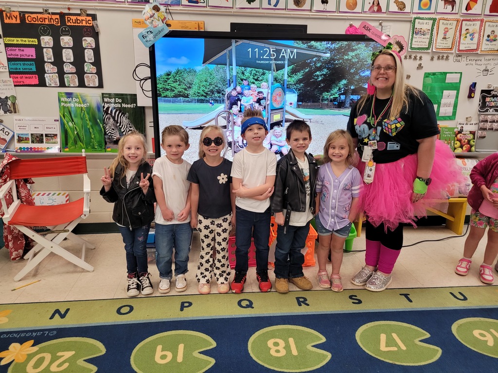 Mrs. Dilbeck's kindergarten class in their HOCO decade fashion.
