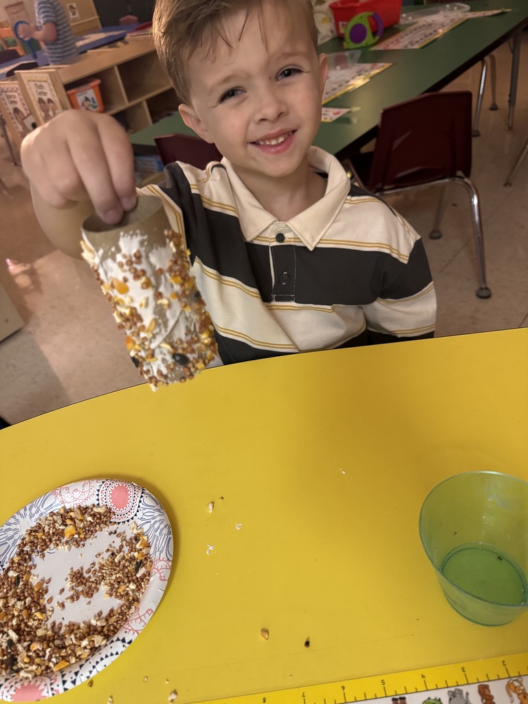 Mrs. Allen's PreK made owl feeders.